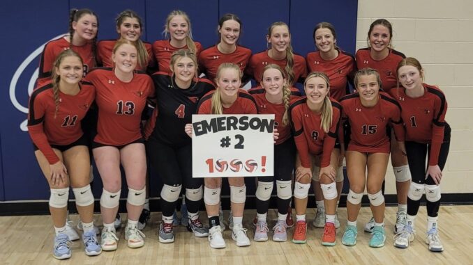 Emerson Helget with team_1,000 set assists